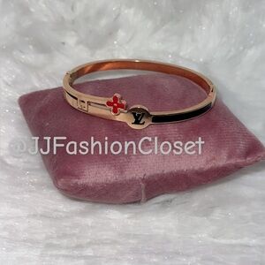 Rose Gold and Black Bracelet with Red Accent